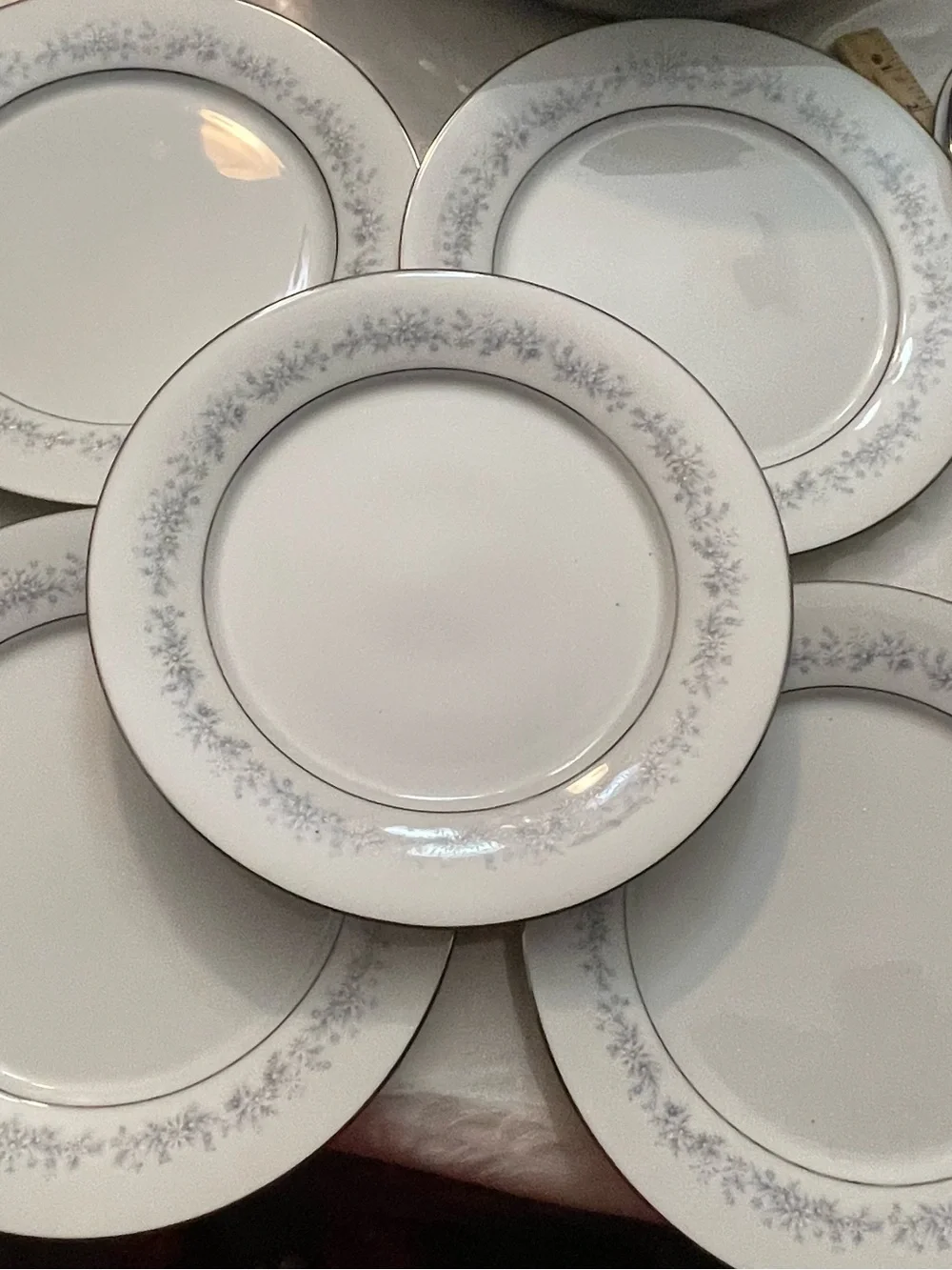 Noritake White Dinner Plate with Pale Blue Floral and Silver Trim